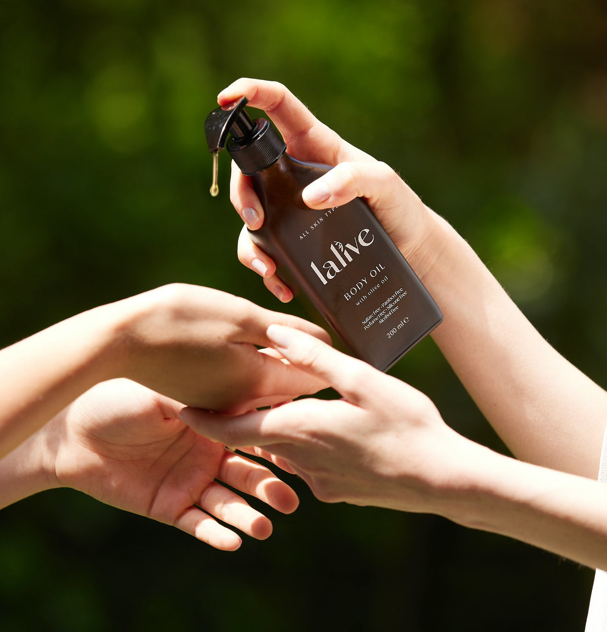 Lalive body oil in hand